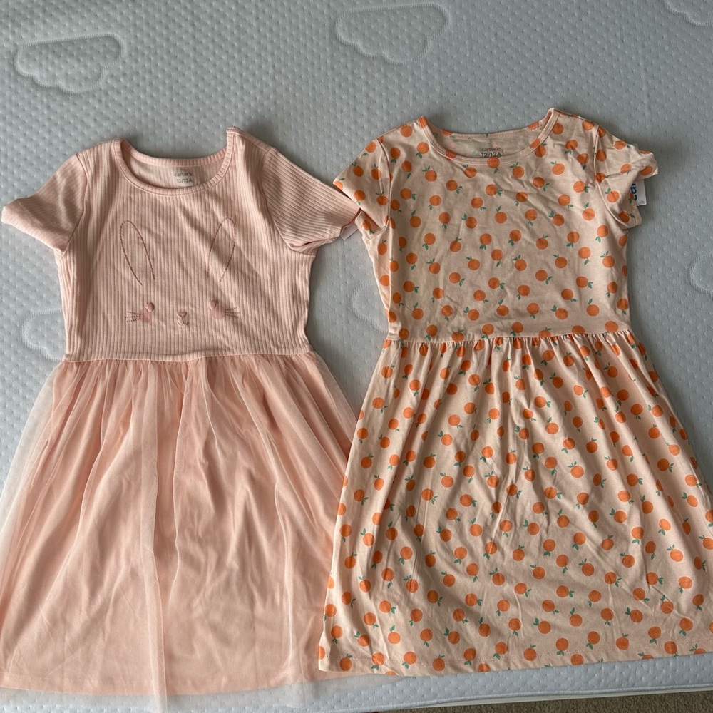 Two dresses by Carter’s. Size 12 new with tags